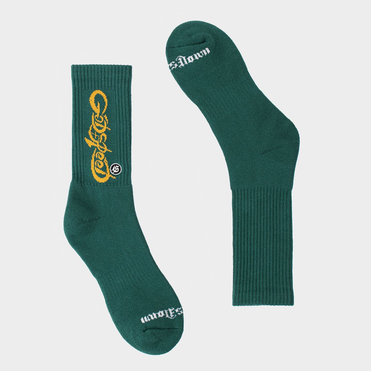 „Godspeed“ grüne Socken im „New Age“-Stil